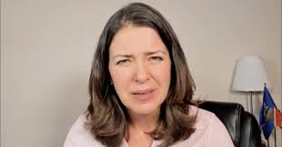 Danielle Smith Boycotted Remembrance Day Poppies, Railed Against  'Mainstream' Medicine