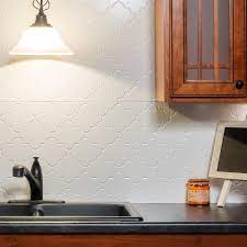 Textural tiles on a backsplash can communicate a theme. Fasade Monaco Matte White 15 Square Foot Backsplash Kit Overstock 14192000