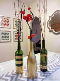 Wine bottle crafts are all the rage these days, and for good reason. Diy Spray Painted Wine Bottles For Fall Decorating Homey Oh My
