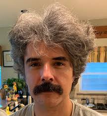 How to Grow Your Hair Out Long (For Dudes)