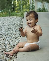 Our boy is 11 months old. We celebrated Maddi's birthday at a camp out. The  night was tough, but other than that it was pretty fun. Frankie is not  walking yet, but