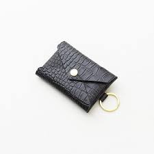 Maybe you would like to learn more about one of these? Crocodile Embossed Leather Keychain Credit Card Wallet Etsy In 2021 Leather Keychain Wallet Leather Keychain Leather Tassel Keychain