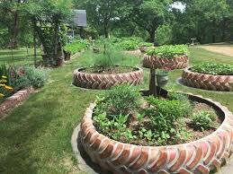Sonja Turned Discarded Tractor Tires Into Amazing Raised Beds Raisedbedgardening Garden Beds Tire Garden Raised Garden