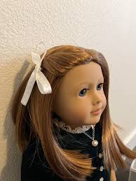 I wanted to document Emily's cute Christmas hair before I took it out! (I  know her pin straight hair will dent if I leave that in longer than a  couple days) :