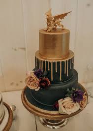 Art Deco Black And Gold Drip Cake Gold And Emerald Drip Cake A Chic Rustic Fairytale Wedding At Dove Hollow Estates Golddripcak In 2020 Black And Gold Cake Emerald Wedding Cake Art Deco Wedding Cake
