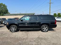 Image result for Black Granite 2012 Suburban