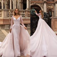 The main feature is skirt, which gives the image of femininity. Marina Maitland Wedding Dress Wedding Dress Detachable Train