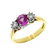 Mined predominantly in madagascar, the pink sapphire is a popular gemstone for engagement and wedding rings.radiating a romance that is perfect for celebrations of love, the designs offered are. Pre Owned 18ct Yellow Gold Pink Sapphire And Diamond Three Stone Ring 01 09 472
