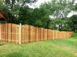 Installing fence posts is a critical component that's responsible for keeping your enclosure upright and straight. Wood Fencing Wooden Fence Builders Md Dc Va Mid Atlantic Deck Fence Since 1986