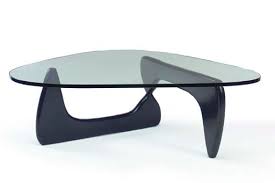 This balance of sculptural form and everyday function makes the triangle coffee table an understated and beautiful element in homes and offices. Isamu Noguchi 1904 1988
