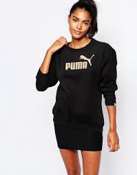 Black And Gold Sweater Dames Puma Gold Logo Crew Neck Sweatshirt At Asos Com Crew Neck Sweatshirt Puma Outfit Sweatshirts Women