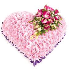 Check spelling or type a new query. Pink Massed Funeral Heart Arrangement From The Edinburgh Florist The Harvest Garden For Local Delive