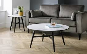 It is a mid century modern style faux. Coffee Tables Julian Bowen Limited