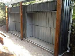 https i2 wp com www backyardworld com au wp content uploads 2016 09 roller door storage sheds jpg roller doors backyard sheds carport makeover