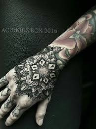 Hand tattoos hold a unique place in the world of ink, and for good reason. Taiwan Acidkidz Tattoo Artist Roxiehart666 Hand Dotwork Geometric Mandala Tattoo Hand Tattoos For Guys Mandala Hand Tattoos Geometric Mandala Tattoo