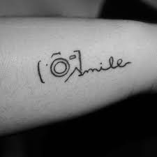 Camera tattoo designs are getting popular and they can range from simple black tattoos to elaborate and intricately detailed colorful ones. Camera Tattoo Ideas For Men Thelatestfashiontrends Com