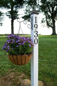 For A Quick Outdoor Update Make A Diy Address Post With Built In Plant Hanger Front Yard Diy Curb Appeal Yard Landscaping