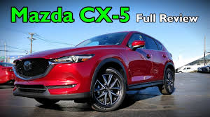 You get supportive seats with lumbar support as standard, plenty of soft materials and a tall centre console that makes you feel cocooned, like you're sitting in a sports car on stilts. 2018 Mazda Cx 5 Full Review Grand Touring Touring Sport Youtube