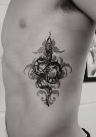 Rib tattoos, rib tattoo, rib tattoos designs, guys, girls, men, women, pain, on rib, best, flower, rib tattoos images, side, on rib cage, rib tattoos ideas. 53 Awesome Rib Cage Tattoos