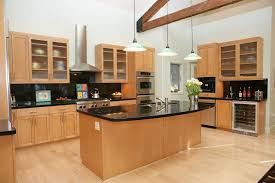 Modern Kitchen With Dark Granite And Light Maple Cabinets Maple Kitchen Cabinets Modern Kitchen Flooring Light Wood Cabinets