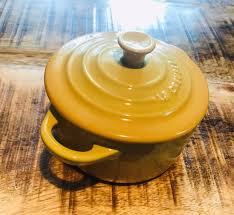 They are built of materials including ceramics, cast iron, and aluminum alloy. Le Creuset Stoneware Petite Round Casserole Mini Cocotte 8oz Yellow Ramekin Brand New Authentic Petite Round Mini Casseroles Le Creuset Cookware Kitchen Oven