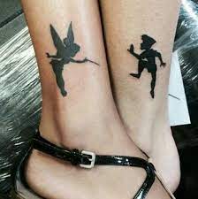 The perfect beauty and the beast tattoo on thigh 3. Absolutely Love This Tattoo His Amp Hers Peter Pan Tattoo Tattoos Matching Couple Tattoos