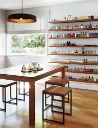 In two separate pieces, the mid century wall wine rack by oenophilia allows you to create your own installation to best suit your space and your sensibilities while artfully a wine rack as well as an incredible work of modern art. Tour A Mid Century Modern Home With Its Own Perfumery San Francisco Real Estate