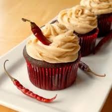 Pin By Allrecipes On Cupcakes Chocolate Chili Frosting Recipes Chocolate Cupcakes