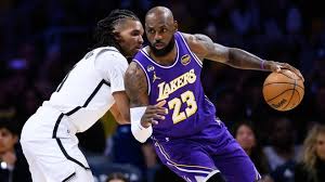 LeBron James, Bronny James combine for first father-to-son assist in NBA history