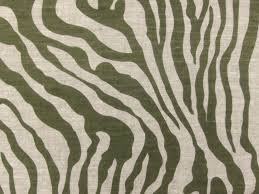 Crafted from metal, its adjustable height frame features a curved back design wrapped in fabric upholstery with a cheetah print pattern in hues of cream. Linen Upholstery Olive Zebra Print B J Fabrics