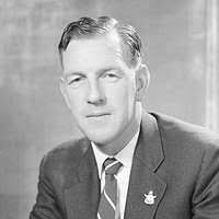 Alfred Hitchcock, head-and-shoulders portrait, facing right]