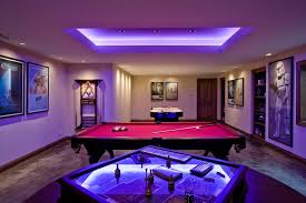 The object of the game is to solve a murder. Basement Game Room With Stained Concrete Floor And Fluorescent Indirect Lighting Traditional Basement Chicago By Orren Pickell Building Group Houzz