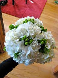 Ring bouquets are super trendy, but they're also easy to make! Our Florist Is Whole Foods