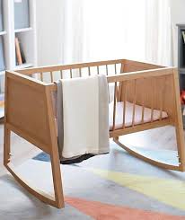 Inspired By Vintage Cradles Our Olin Bassinet Has A Clean Modern Design And Solid Teak Construction Plus Rocking Bassinet Baby Cradle Wooden Modern Bassinet