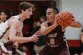 John Glenn boys basketball rallies to beat New Philadelphia