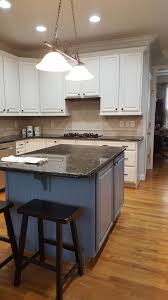 It's a pale, warm gray and after painting it in swatches all over our kitchen (and crossing my fingers and toes), it ended up being such a great shade against our cream cabinets. Wall Paint Colors For Cream Kitchen Cabinets Novocom Top