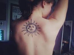It can be worn by both, men and women and symbolizes a deep connection. Simple Sun And Moon Tattoo On Girl Upper Back