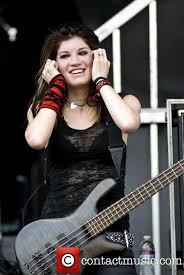 Her genre is hard rock. Emma Anzai Sick Puppies Sick Puppies Movie Stars Female