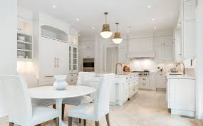 There is no better way to complement your white kitchen cabinets than detailing it with gold handles. White Kitchen Cabinet Ideas Beautiful Cabinetry Designs