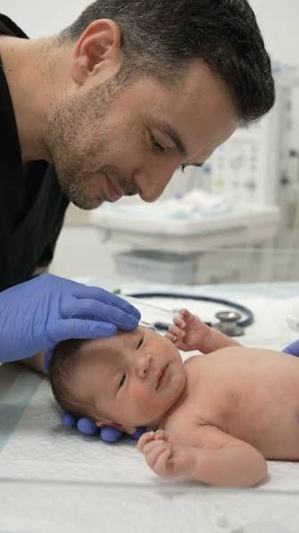 A heart-melting video from a hospital has taken social media by storm. The  clip opens inside a hospital room where a woman&mdash;believed to be a nurse or  attendant&mdash;is holding a newborn baby