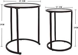 Its round tabletop, crafted in the style of a stained glass window, depicts a floral motif, while a metal frame showcases curved legs that complete the design. Amazon Brand Umi Round Nest Of Tables Side End Coffee Tables Set Of 2 With Clear Glass Tops For Living Room Bedroom Amazon Co Uk Kitchen Home