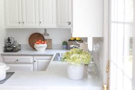 Updating your kitchen or bath with a new laminate countertop is a great way to refresh the room. How I Painted My Kitchen Countertops Andie Mitchell