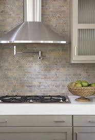 Pin By Lilian C On Renovation Kitchens Taupe Kitchen Stone Backsplash Kitchen Kitchen Tiles Backsplash