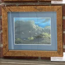 We have a few paintings by local iconic artist, Wayne Fulcher  (1939-2016)...The Cape Henry Lighthouses, nearby seaside respites, sailing  adventures, beaches, and many more! Come visit us