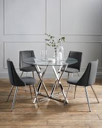 The round table is larger than most on the market, so there's more than enough room for everyone. Estelle Table 4 Anais Velvet Chairs Home Essentials