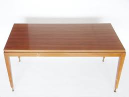 They hide away inconspicuously as a coffee table in your living room and transform into full dinner tables at will. Mid Century Pull Out Coffee And Dining Table 1960s For Sale At Pamono