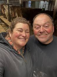 Hi, We are Karin and John from @woodbridge_dairy_farm in West Michigan.  This is day 1 of our takeover. John is definitely not a morning person (the  look is why are you taking