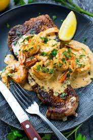 Steak In Creamy Cajun Shrimp Sauce Surf And Turf Recipe Steak Dinner Recipes Beef Recipes