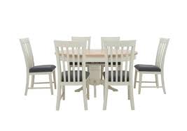 Extendable round dining room table modern solid wood medium brown. Angeles Round Extending Dining Table And 6 Wooden Dining Chairs Furnitureland Furniture Village
