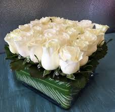 25 white roses in low gl square in